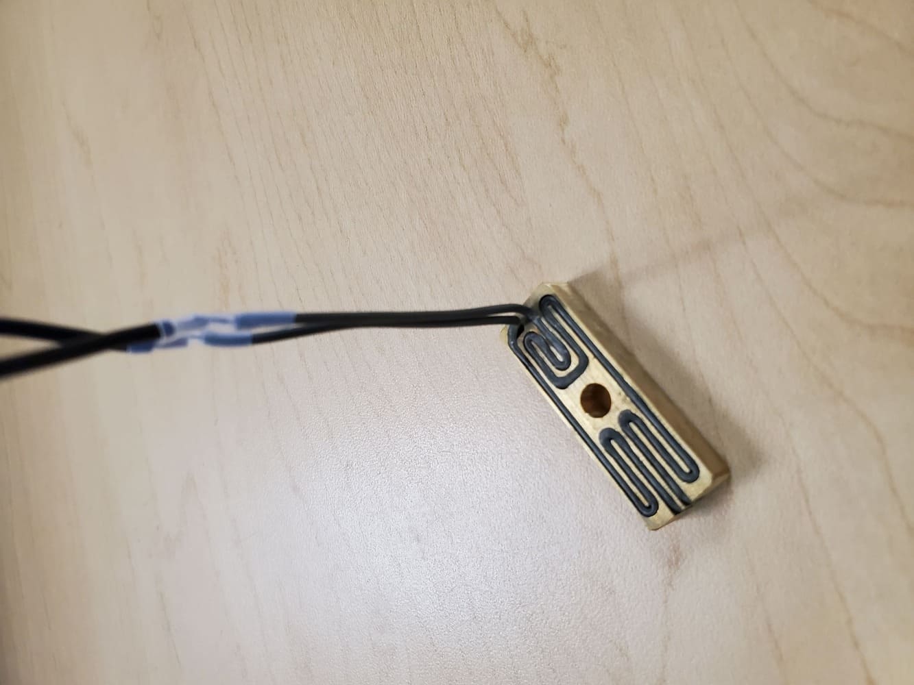Heated assembly component